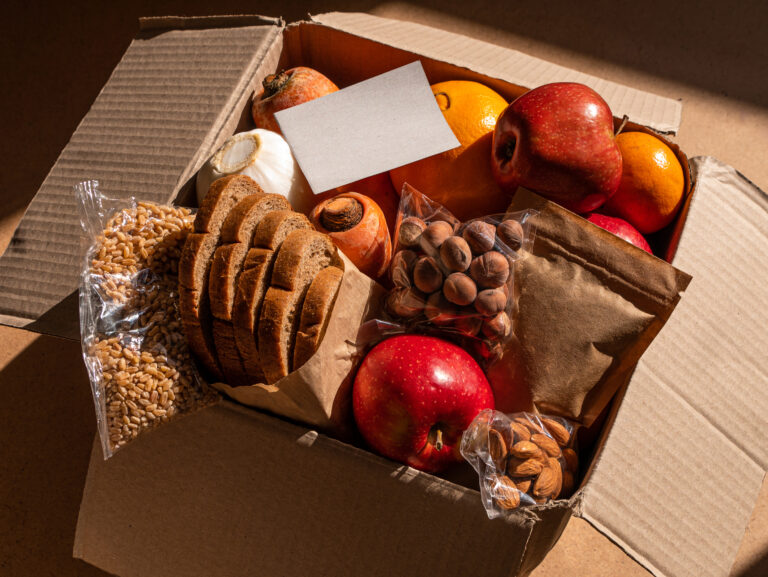 Healthy food delivery flat lay harsh shadows. Take away natural organic products.Donation box New normal online shopping